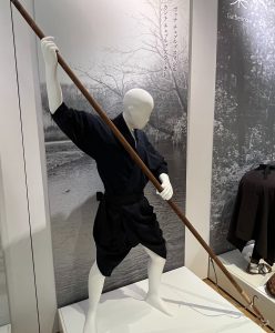 museum mannequin posed for spear fishing