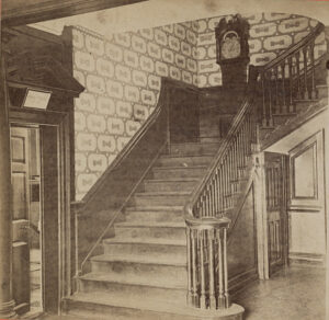 Hall and stairway, Mt. Vernon Mansion, showing clock at head of stairs, 1883