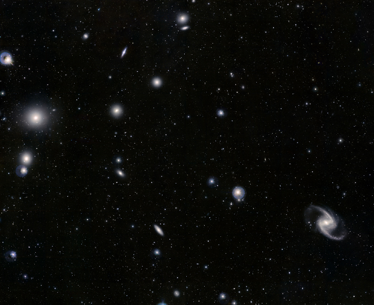 Image of the Fornax Cluster of Galaxies. Many elliptical and spiral galaxies are scattered throughout the image.