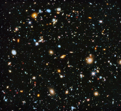 Hubble Ultra Deep Field. This remarkable HST image contains many thousands of galaxies of all morphological types uniformly spread over the entire frame.