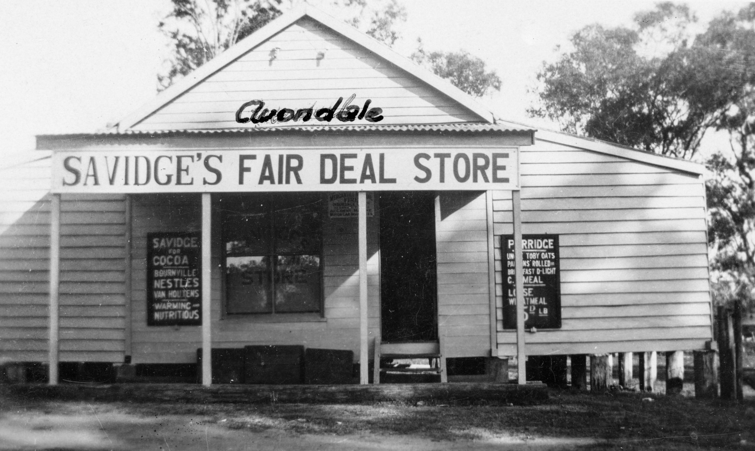 A black-and-white photo of Savidge's Fair Deal Store.