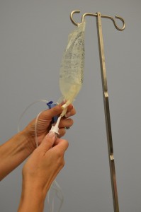 Spiking an Iv solution bag with IV tubing