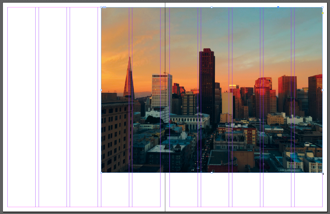 Screen capture showing a photo of a city skyline placed into a two-page spread layout in InDesign. The photo is 7 columns wide and positioned on the right side of the spread, leaving 3 columns of space on the left side of the spread.