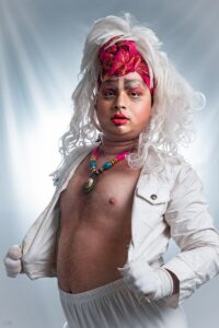 This is an image of Patruni Sastry, an Indian expressionist dancer, folk singer, and tranimal drag artist.