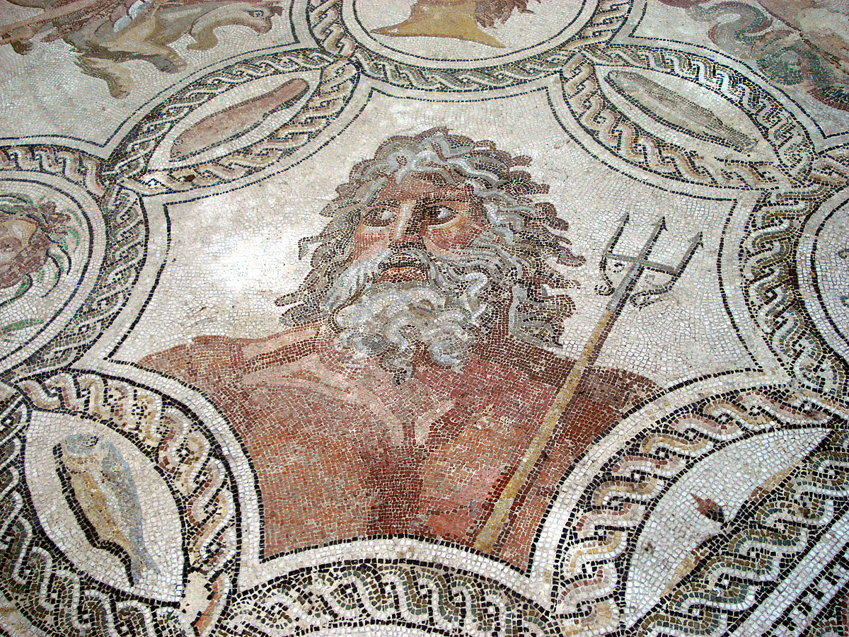 Head and shoulders of Nepturne holding a trident, surrounded by small mosaic fish.