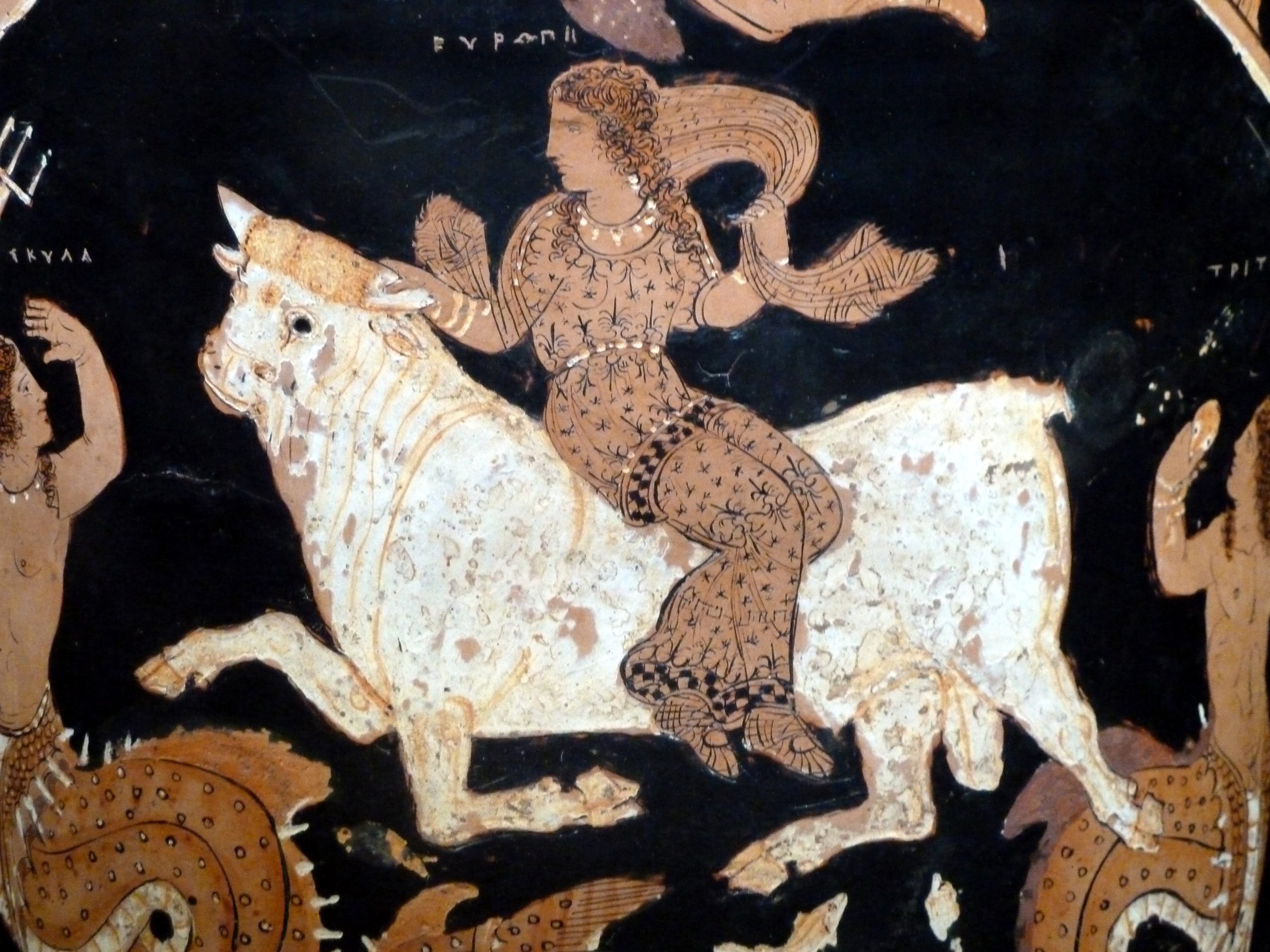 Europa, a young woman, sitting on the back of a running bull.
