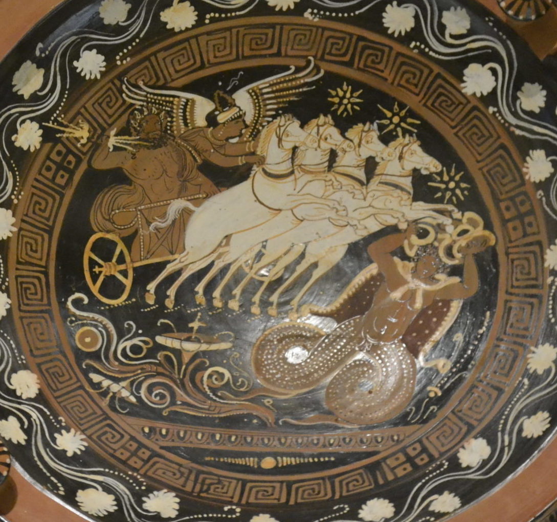 Zeus in a chariot pulled by 4 horses. He is wielding a 3-pronged lightning bolt and fighting a giant who has snakes for legs.