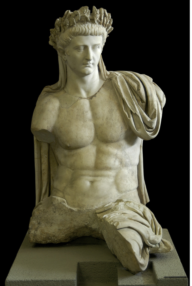 Nude torso of Tiberius wearing a laurel crown and drapings.