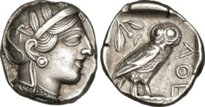 Side 1: head of Athena in an ornate headdress. Side 2: an owl.