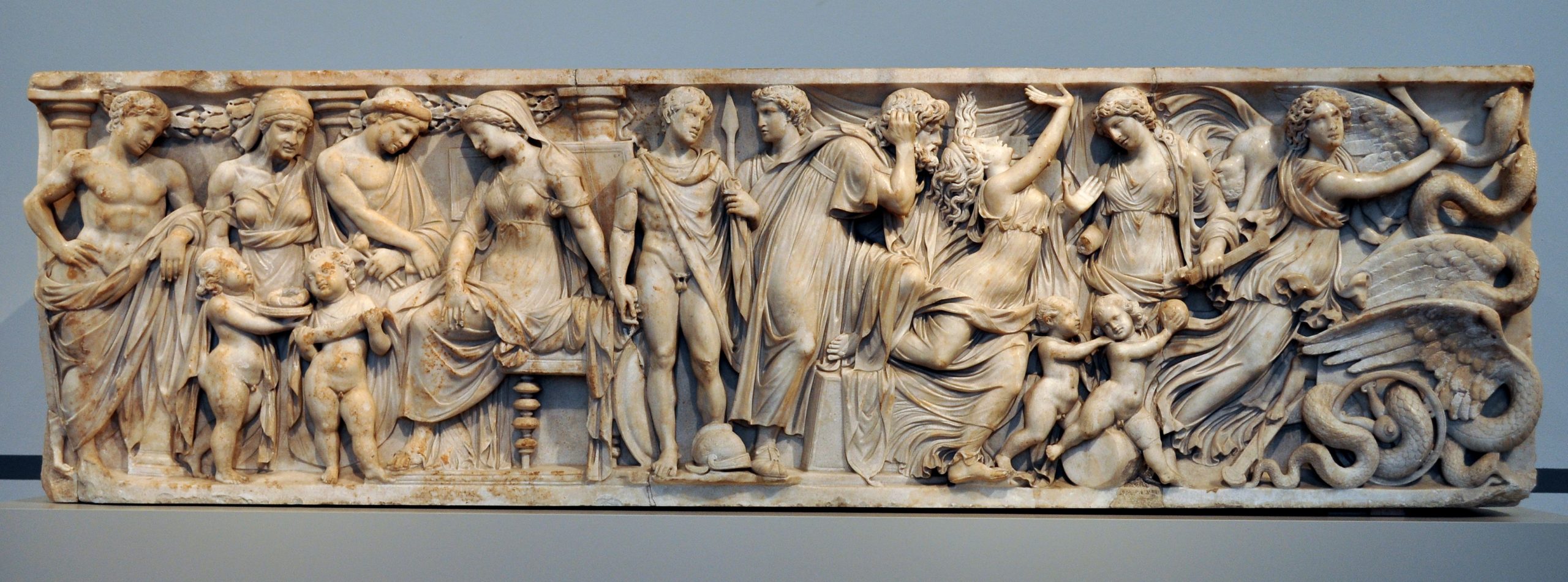 On the far left, are Medea, Jason, and their two children. The next section depicts the courtship of Jason and Creusa, followed by Jason and Creusa in suffering after Medea poisoned them. On the far right is Medea, escaping on her chariot drawn by two winged serpentine dragons.