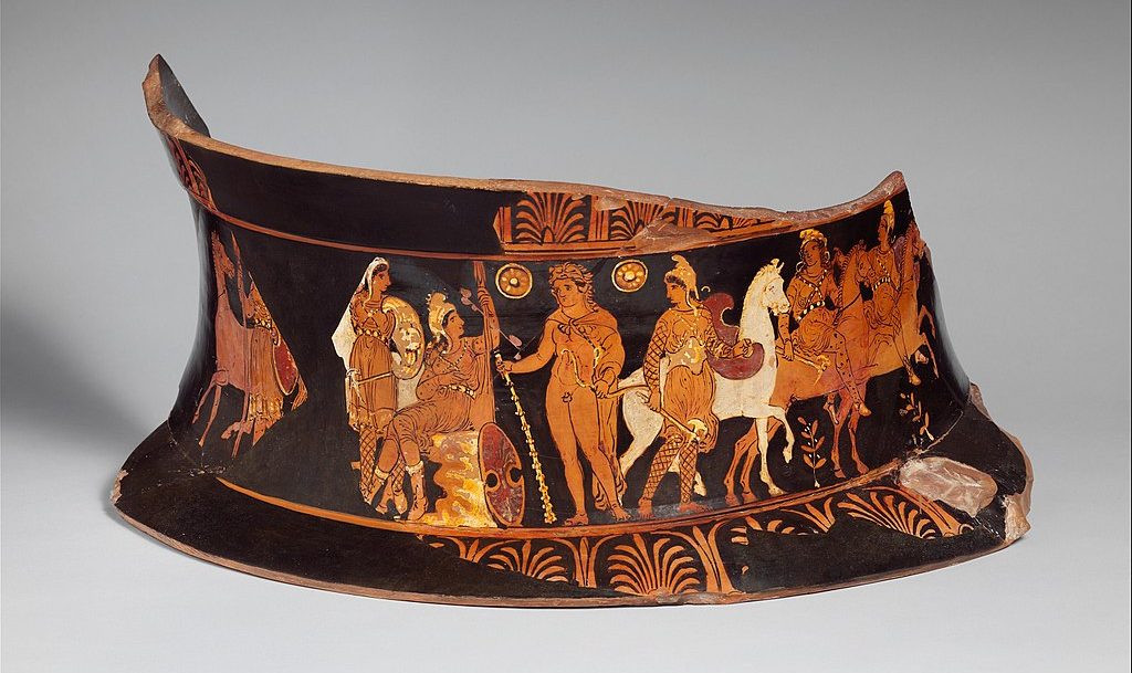 Heracles, wearing his lion skin and holding his bow and club, stands among the amazons. The amazons wear conical phrygian caps, hold axes and crescent-shaped shields, and have cross-hatched patterns on their arms and legs. Some of the Amazons ride horses.