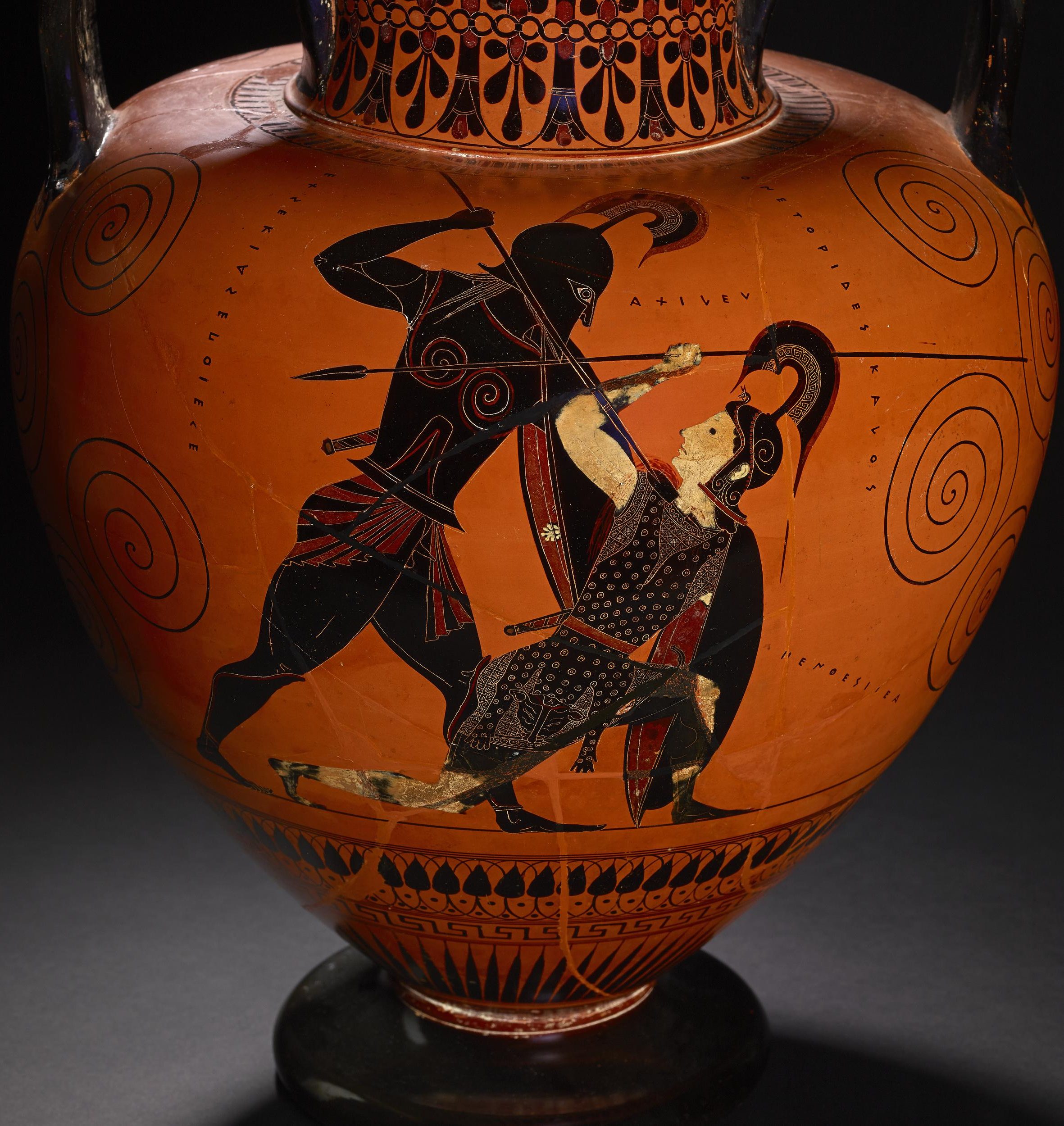 Achilles, with helm and shield, stabs Penthesilea with a spear. Penthesilea wears a tunic and helm, and wields a spear and shield. She has fallen to one knee, and stares up at Achilles.