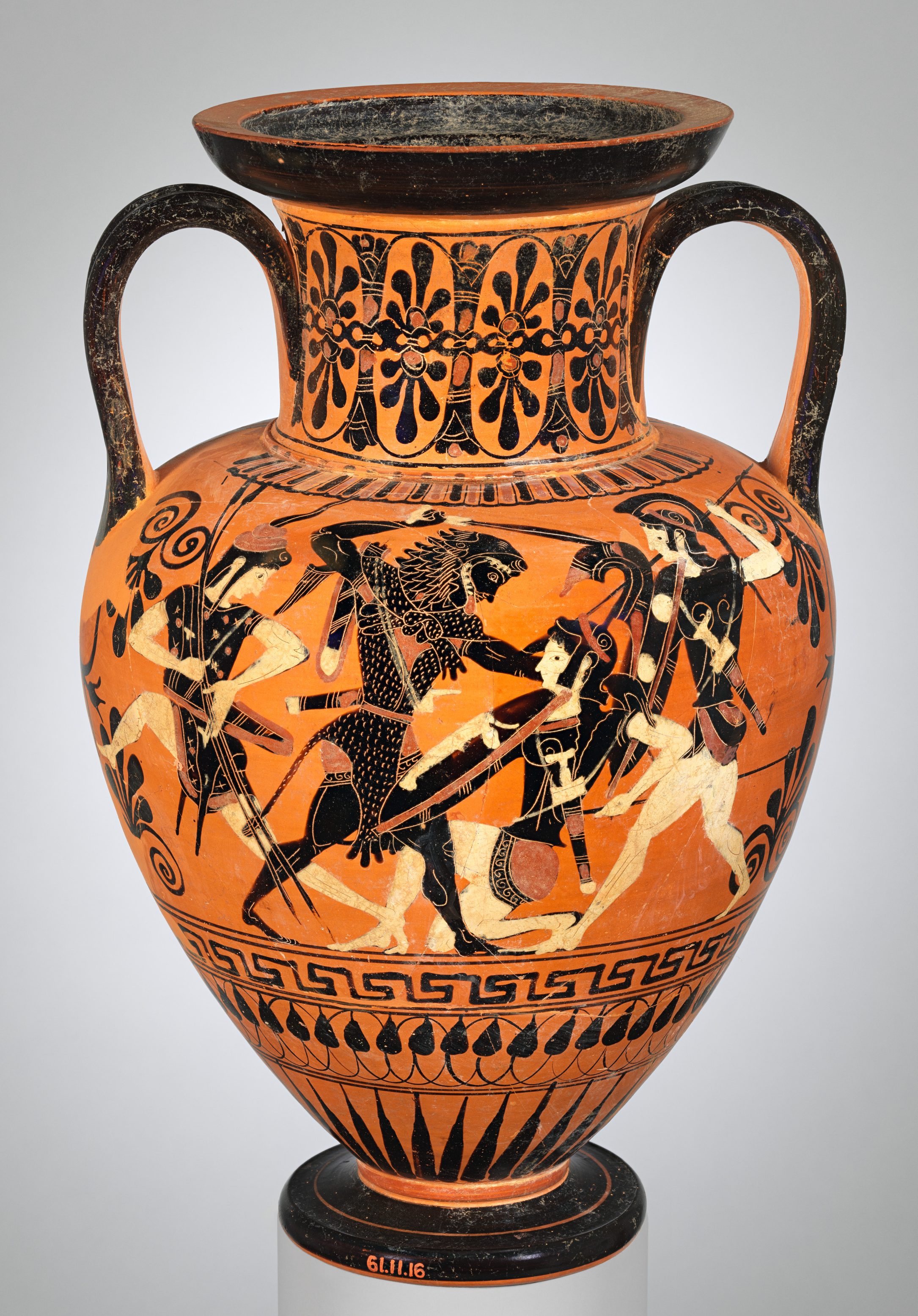 Heracles, wearing his lion skin, attacks an Amazon with a sword. Three Amazons fight him, with helms and spears.