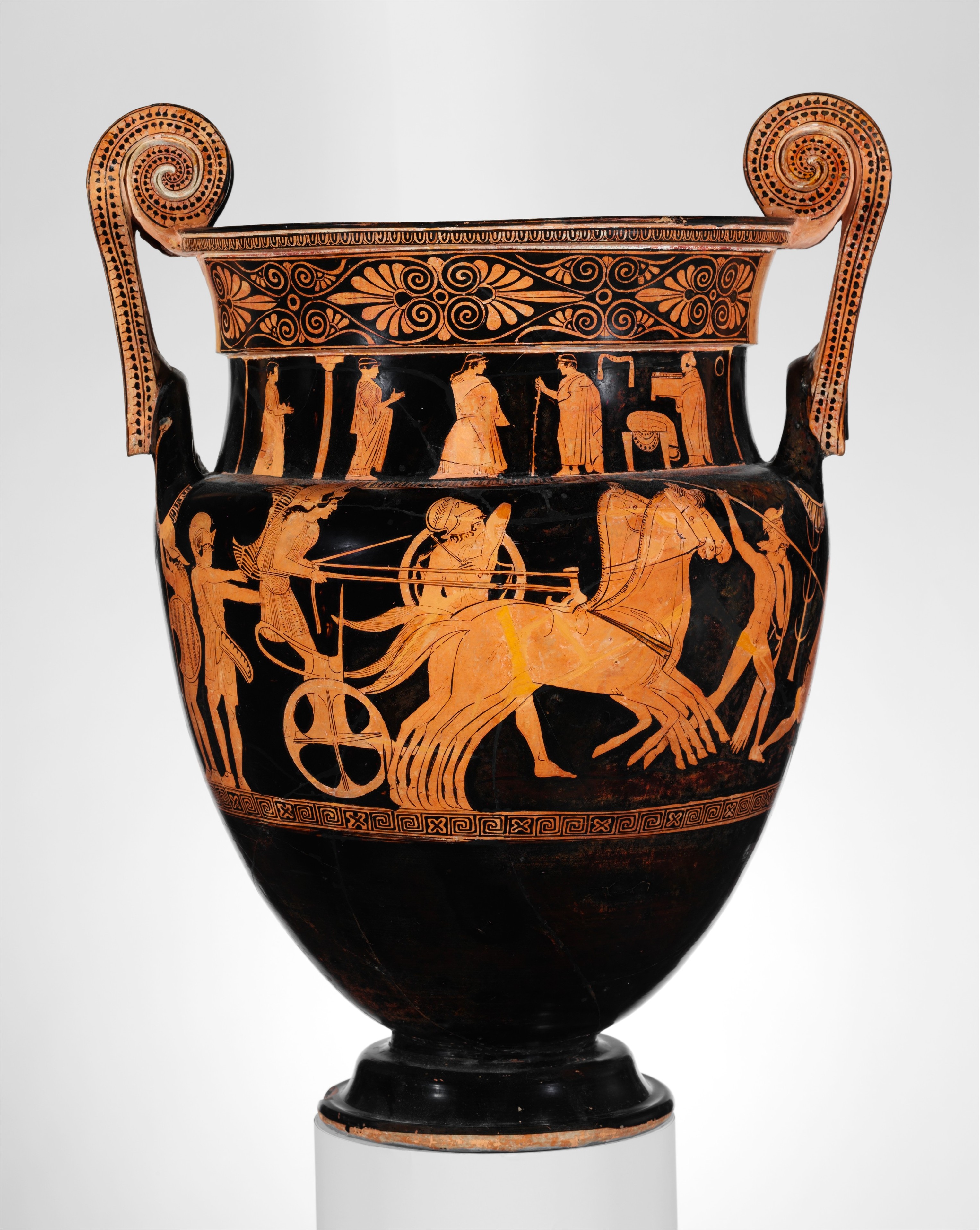An Amazon, in a cap and tunic, rides a chariot pulled by two horses. On either side, three Greek warriors fight two more Amazons.