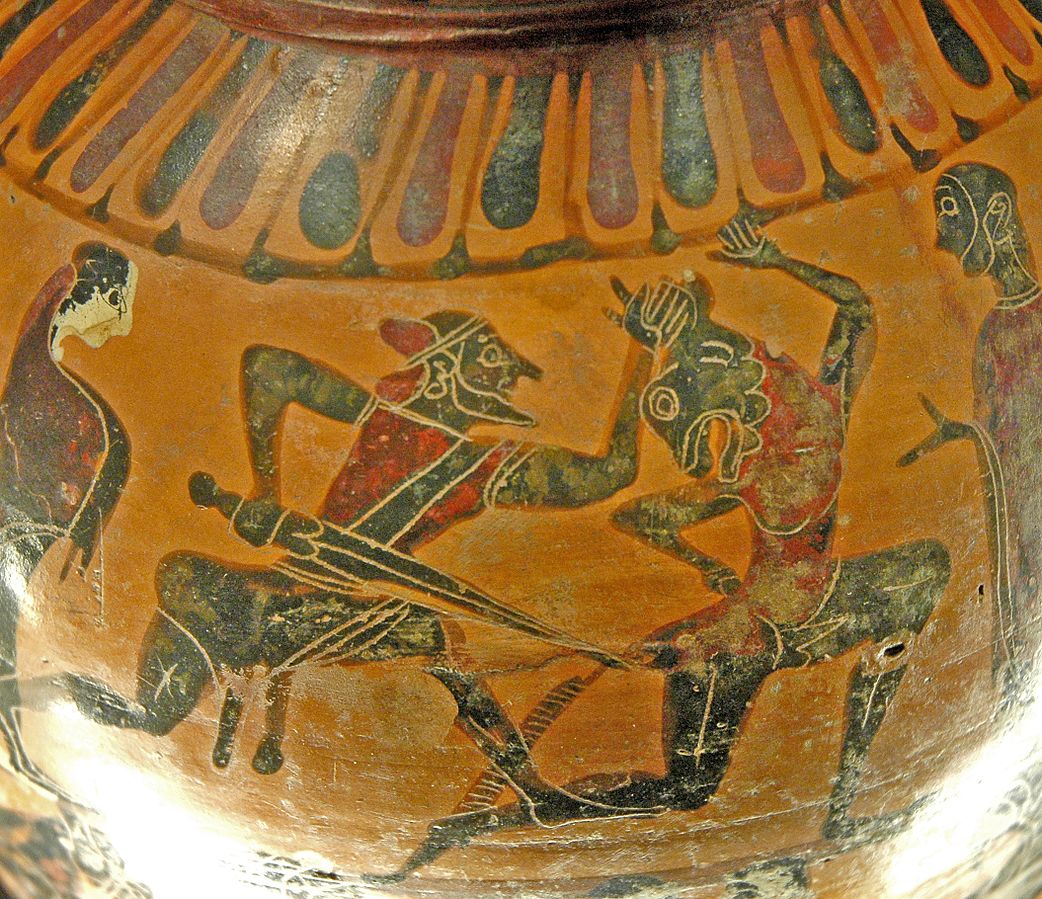 Theseus lunges at the Minotaur with a sword. They are in a chase, both in the archaic running pose. A young woman stands behind, and a man stands in front.