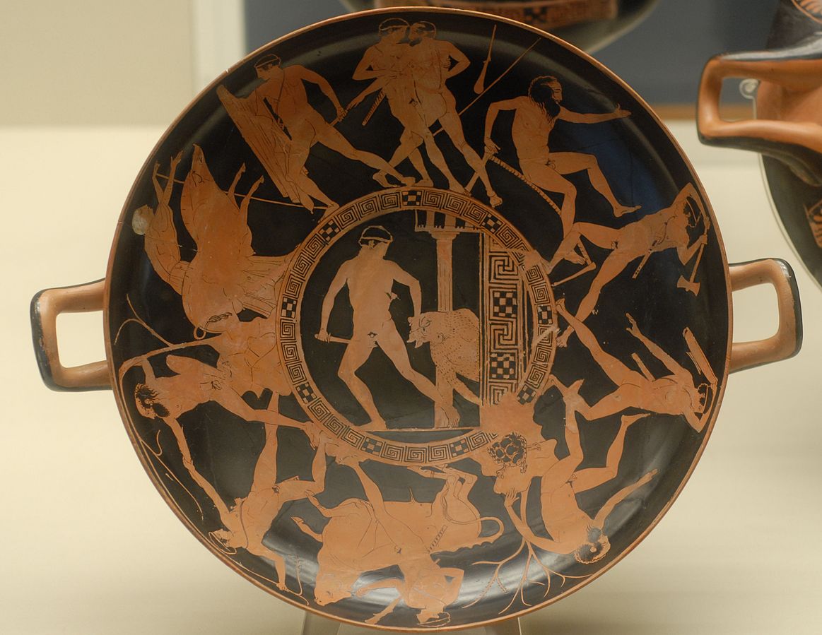 Centre: Theseus, a nude young man with a crown and sword, drags the minotaur out from the columns of the labyrinth. Around, Theseus fights his various foes.