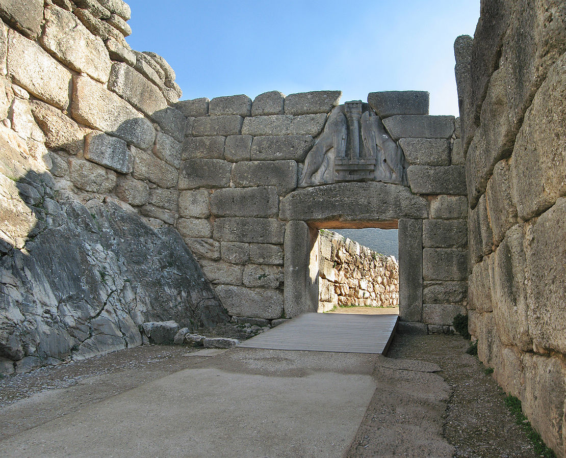 An open gateway of large Ashlar masonry stones. In a triangle above the gateway is a relief of two lions standing facing each other.