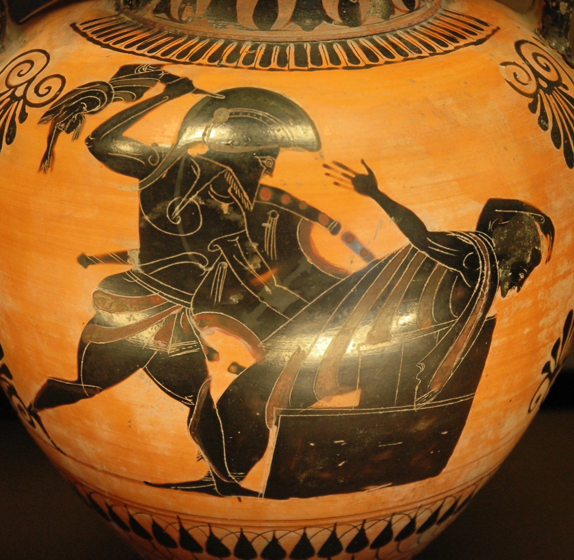Neoptolemus, wearing a plumed helm and armour and carrying a shield, stands over Priam. Priam, wearing a himation and no armour, stumbles backwards onto an altar with an arm thrown up over his head. Neoptolemus wields a small child like a weapon to attack Priam.