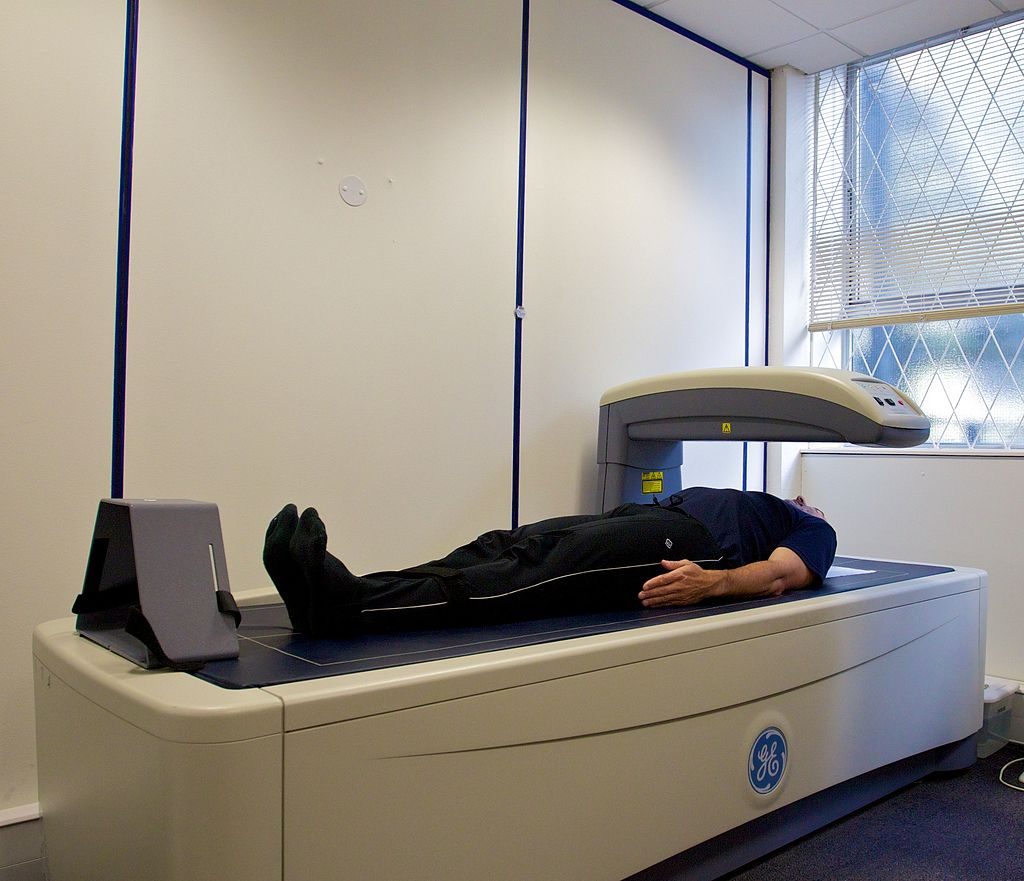 DEXA scan being performed on a man