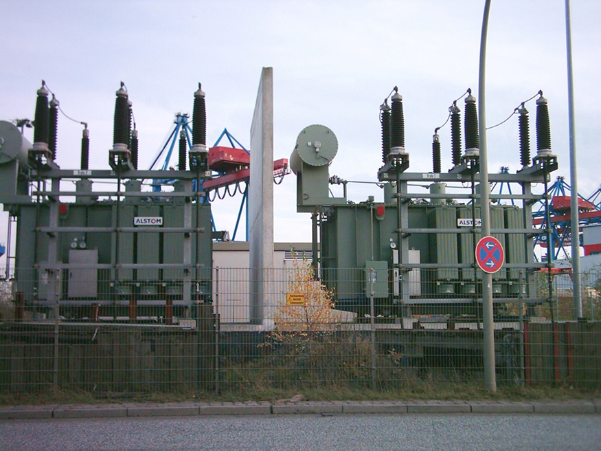 Photograph of transformers installed in transmission lines.