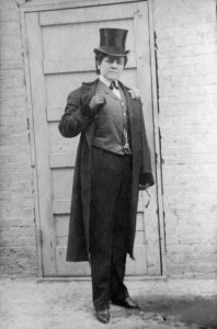 Popular culture (sometimes called low, low-brow, or vernacular) began the process of massification of culture in the modern era. Daisy D'Avara, pictured here ca. 1909, was a dancehall girl in the Klondike and a vaudeville performer thereafter. (City of Vancouver Archives, AM1645-: CVA 19-38) http://searcharchives.vancouver.ca/signed-photograph-by-daisy-davara-of-herself-top-hatted-in-contented-woman