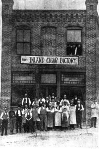 Historic view of the Inland Cigar Factory in Kamloops, 1895. Note the presence of child workers. (Source: Canada's Historic Places website) http://www.historicplaces.ca/en/rep-reg/image-image.aspx?id=12793#i3