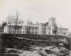 The Provincial Lunatic Asylum in New Westminster, shortly after it was opened in 1878. It would subsequently become known as the Provincial Hospital for the Insane and, from 1950, as Woodlands School. Photo by S.J. Thompson. (British Columbia Archives) https://commons.wikimedia.org/wiki/File:NewWestminsterAsylum1878.jpg