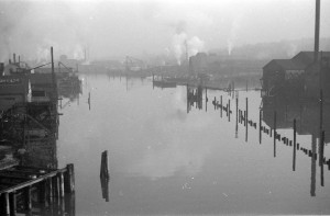 The Big Smoke. False Creek in 1936, its size reduced by one-third and its waters choked with log-booms.