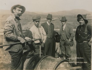 What used to be called "Turner Valley Skunk Juice" -- naptha gasoline -- is piped into drums, 1914. (Canadian Copyright Collection, Picturing Canada Project, British Library) https://commons.wikimedia.org/wiki/File:Filling_drums_with_oil_at_Dingman_Well_(HS85-10-28964).jpg