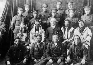 Aboriginal soldiers of the Canadian Expeditionary Force (CEF) along with elders, ca. 1916-17.