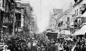 The largest city in English-Canada, Toronto covered a relatively small area. Public celebrations – like this one for the Boer War in 1901 – brought thousands into the streets. Notice how pedestrians, cyclists, streetcars, and horse-drawn wagons compete for space. (City of Toronto Archives) https://commons.wikimedia.org/wiki/File:PretoriaDayCelebrations.jpg