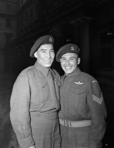 Brothers Tommy and Morris Prince – a sergeant and a private, respectively – at an event at Buckingham Palace, 1945.