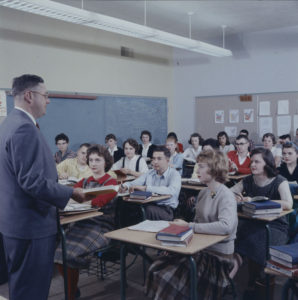 The baby boom, increased rates of school completion, and older facilities combined to create crowded classrooms and demand for new school construction and more teachers. Laurentian High School, Ottawa, 1959.