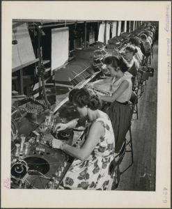 Figure 10.10 Post-war women could find 'pink-collar' jobs like teaching and nursing but also in industry, where they were valued for 'fine work' -- but not so much they were paid as much as men. Women at Canadian Marconi in Montreal, ca. 1949-58. Photo by Malak. Canada, Dept. of Manpower and Immigration, Library and Archives Canada.