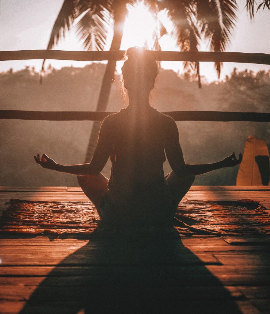 A morning yoga session peering into the jungle in Ubud, Bali.