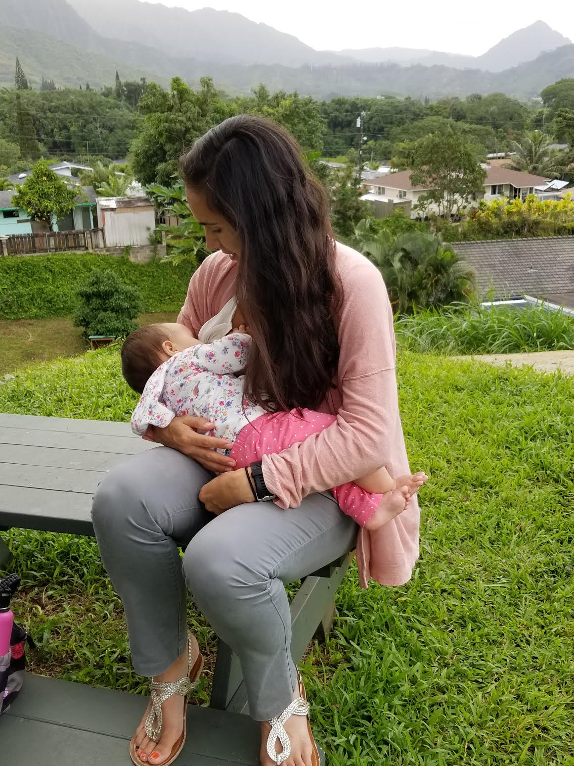 Woman breastfeeding an infant