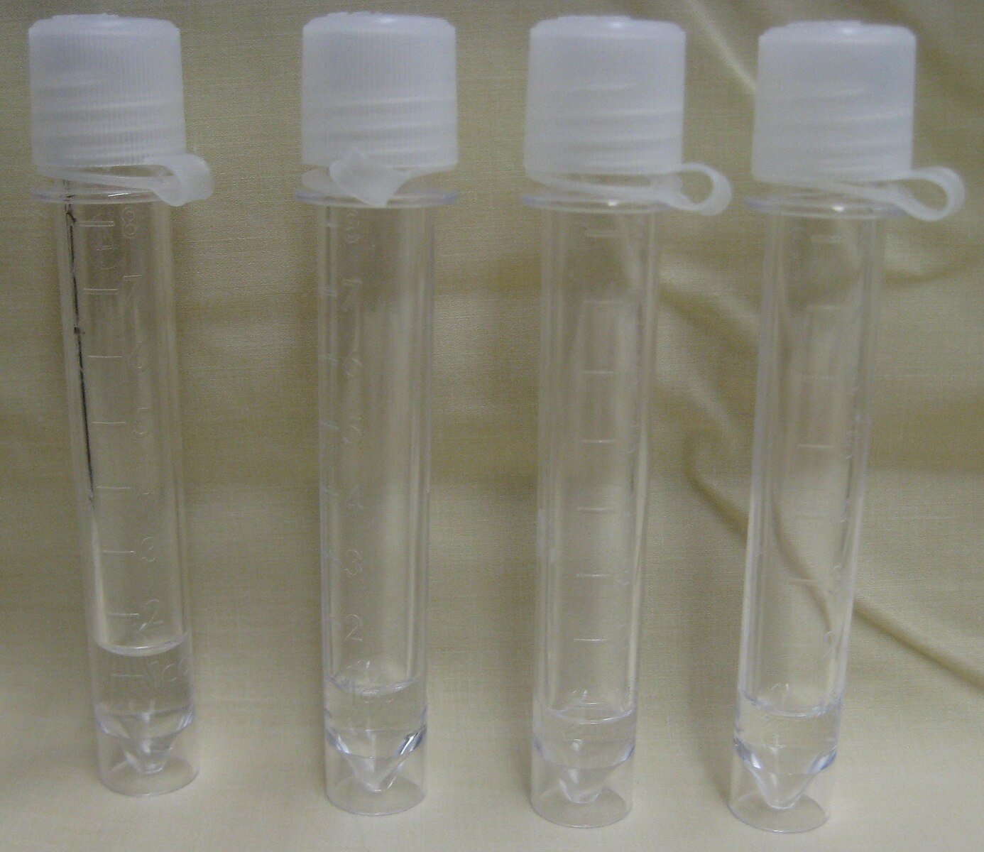 4 vials of human cerebrospinal fluid.