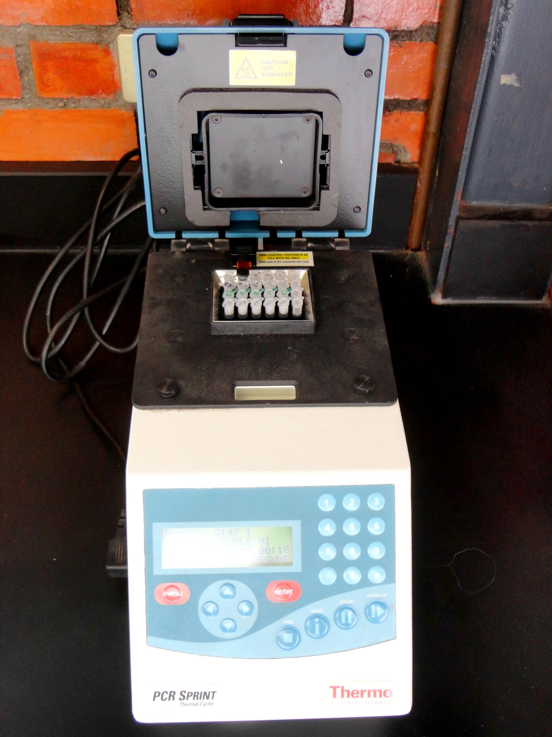 Thermal cycler used to amplify segments of DNA via the polymerase chain reaction (PCR).