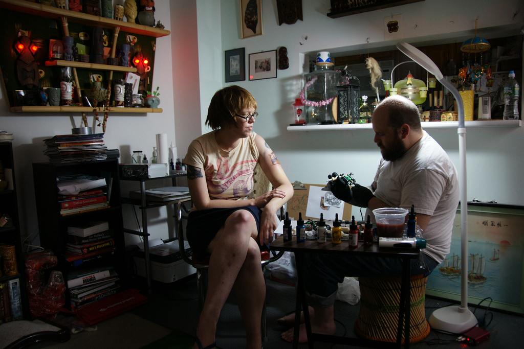 A woman getting a tattoo