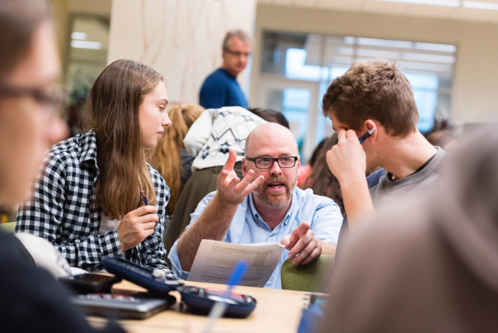 Instructor with students