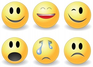 Figure 5.6 Emoticons are a type of nonverbal behavior for electronic messages. Source: Emoticons by Gustavo26776 (http://wikimediafoundation.org/wiki/File:Emoticons.gif) used under CC BY SA 3.0 (http://creativecommons.org/licenses/by-sa/3.0/deed.en)