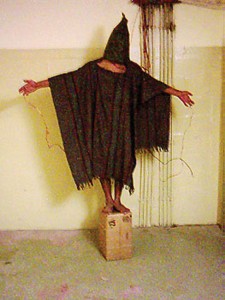 Figure 6. 11 Source: Abu Ghraib Abuse standing on box (http://en.wikipedia.org/wiki/File:AbuGhraibAbuse-standing-on-box.jpg) is in the public domain (http://en.wikipedia.org/wiki/Public_domain)