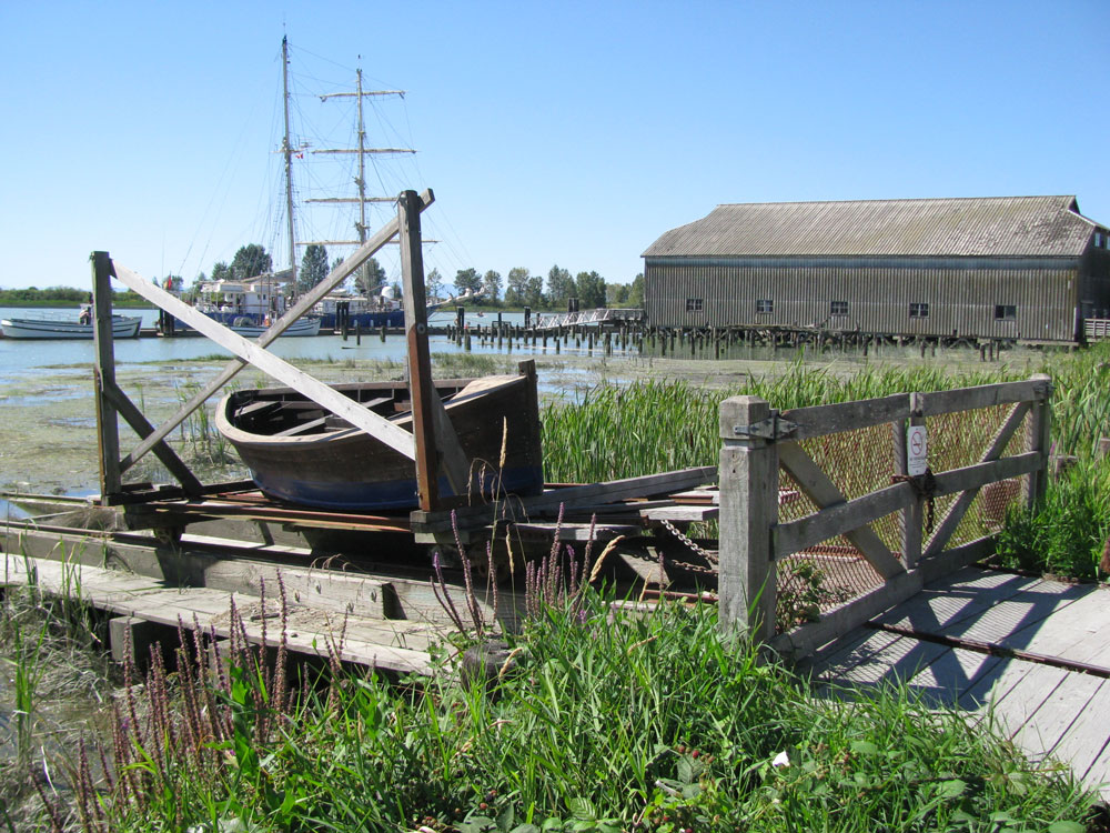 row boat and shoreline scene in Richmond BC