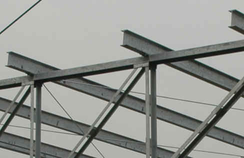 Figure is a photograph of steel I-beams are used in construction.