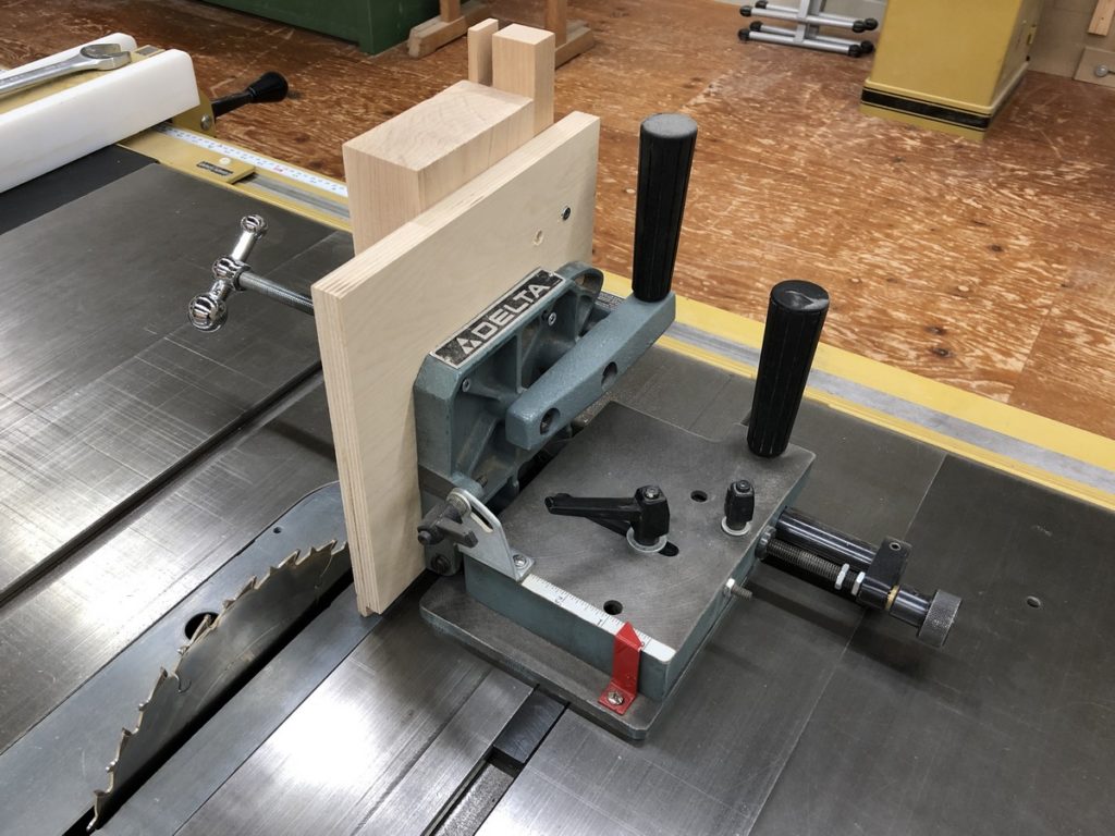 Commercial tenoning jig, it rides in the mitre slot.