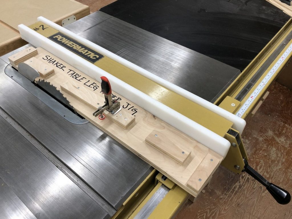 dedicated taper jig shown in position on the saw table.