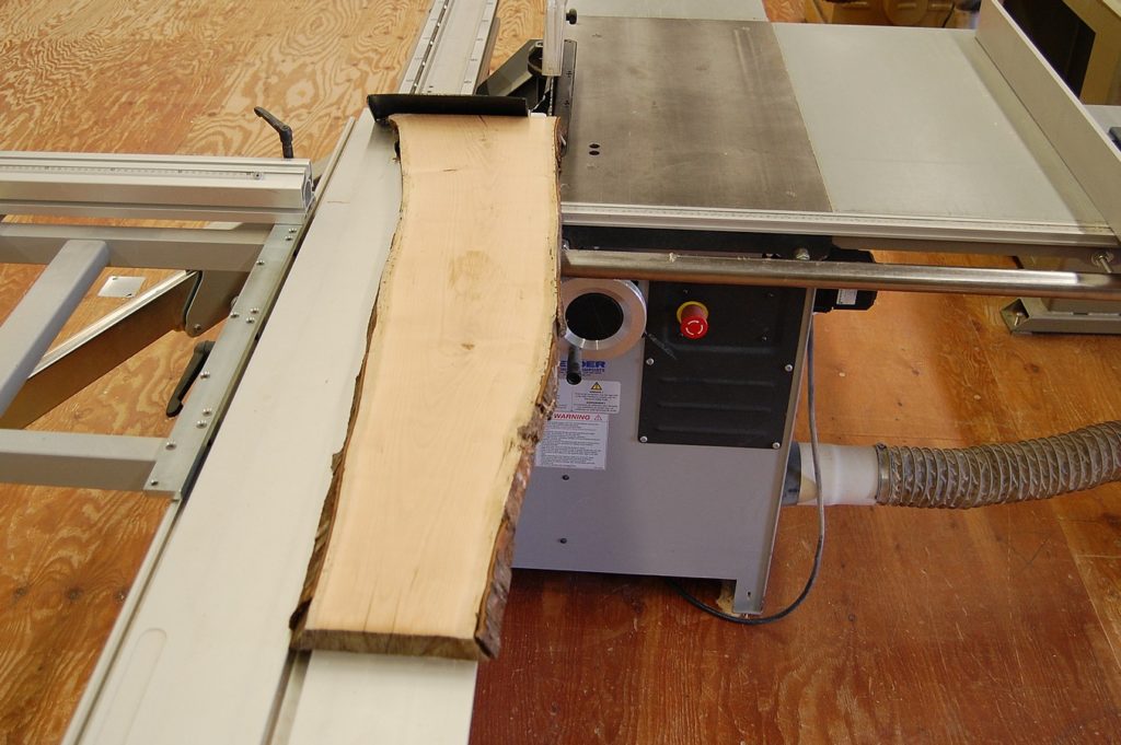 Straight line ripping on the panel saw, using the ripping shoe