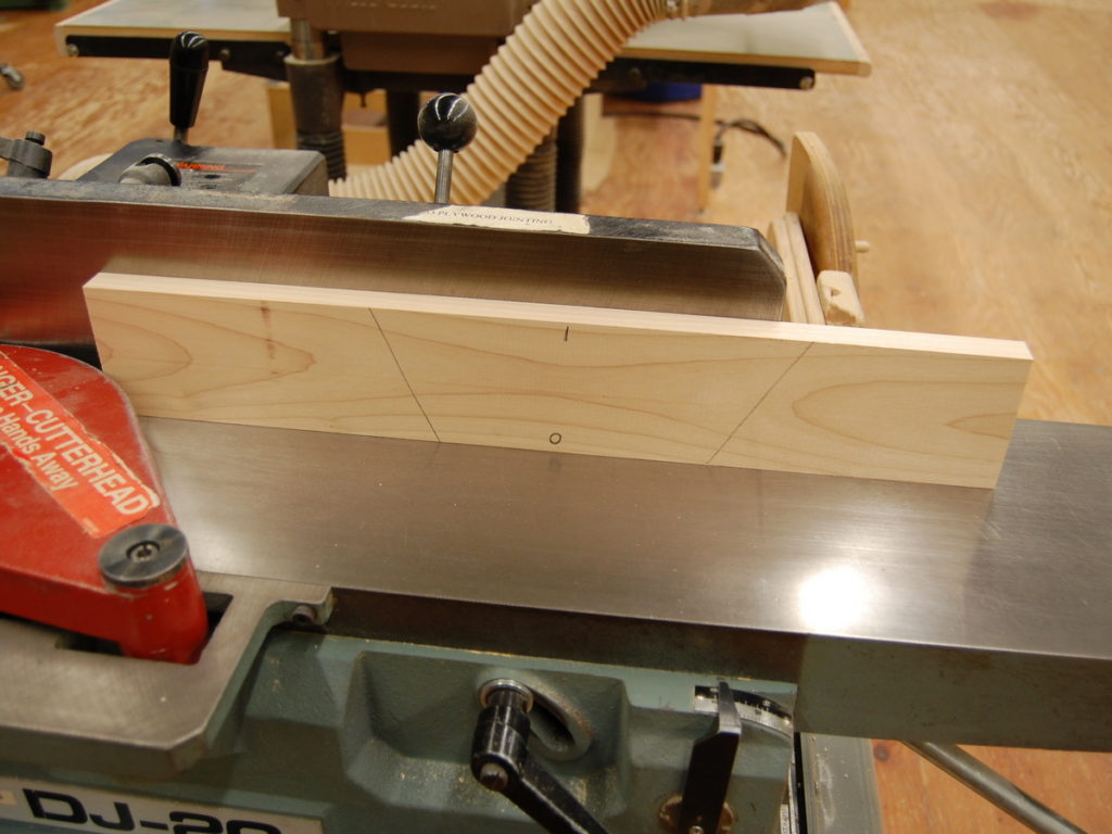 Jointing edges, face in and face out. Jointer shown with workpiece against the fence.