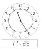 the hour hand is between 11 and 12, the minute hand is pointing at 5